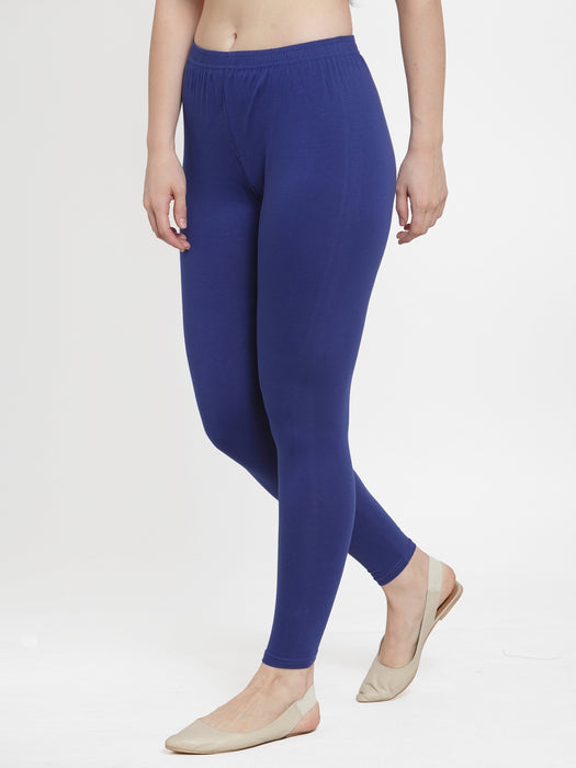 Side view of blue cotton lycra leggings showcasing a snug fit and stretchable fabric for enhanced comfort and style.