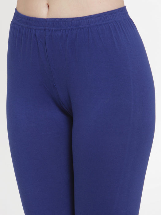 Detailed close-up of the waistband and fabric texture of blue cotton lycra leggings, highlighting the soft and stretchable material.